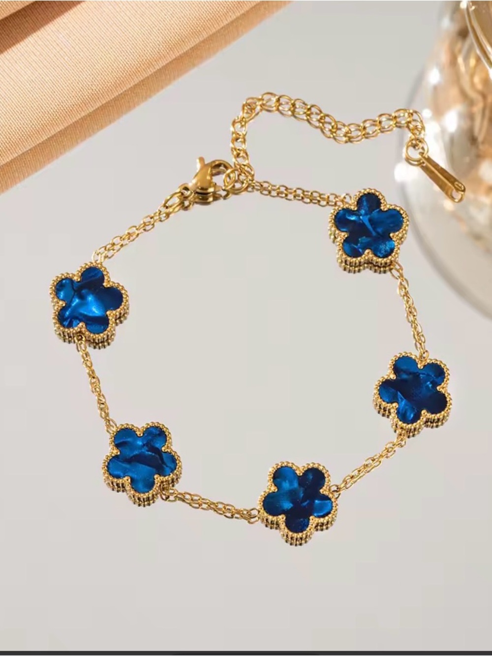 Gold Bracelet with Blue Clover Accents - Women's Jewelry